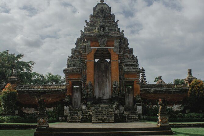 Full Day Private Tour to Ubud Waterfall and Tanah Lot Sunset - Sacred Monkey Forest Sanctuary in Ubud: temple-and-nature in one compact stop